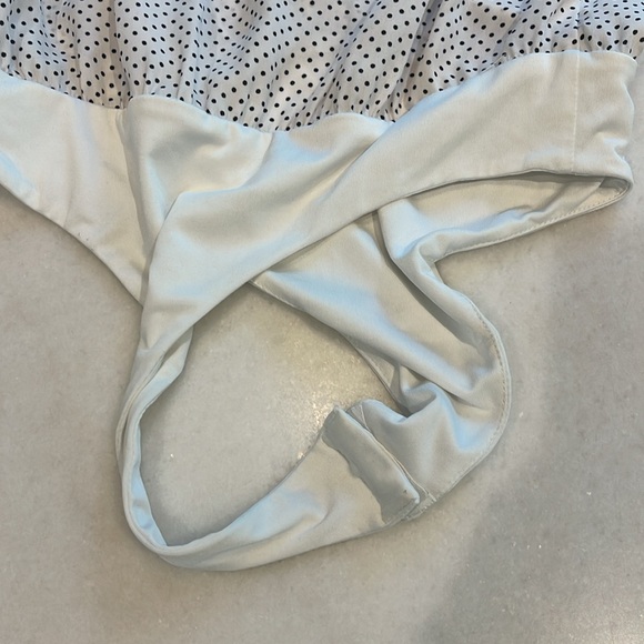 NUDE POLKADOT THONG BODYSUIT WITH RUFFLE TRIM L/S. S - Picture 7 of 9